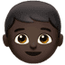 👦🏿 boy: dark skin tone display on Apple